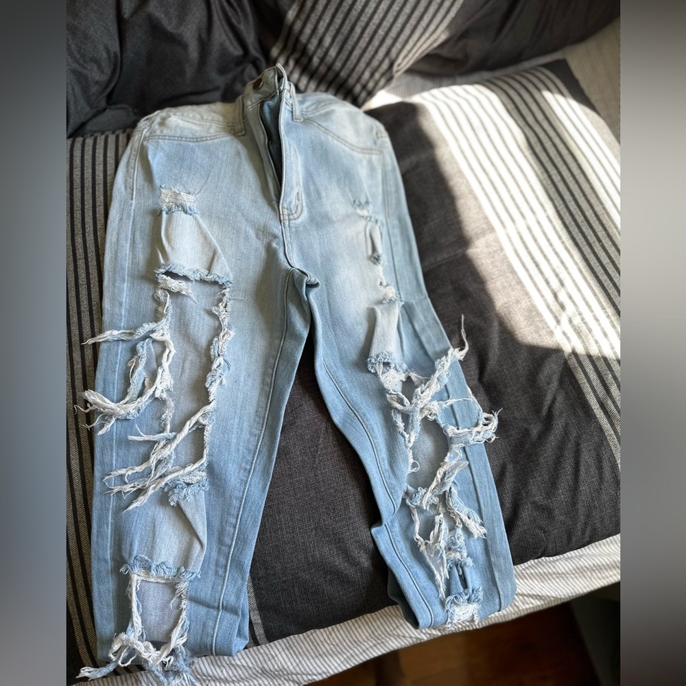 Ripped jeans, never worn